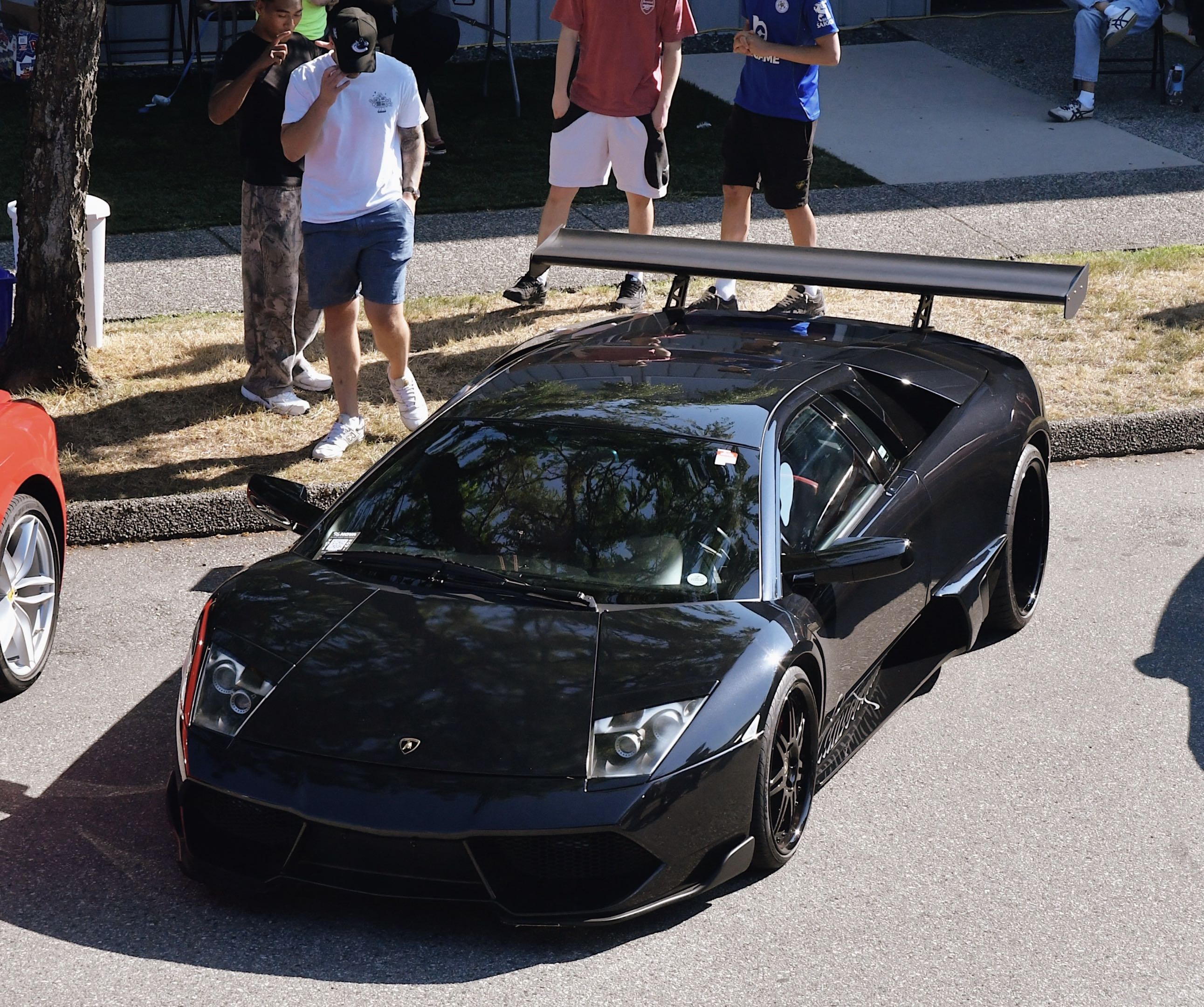 Black Lamborghini Murcielago at a Nova event
